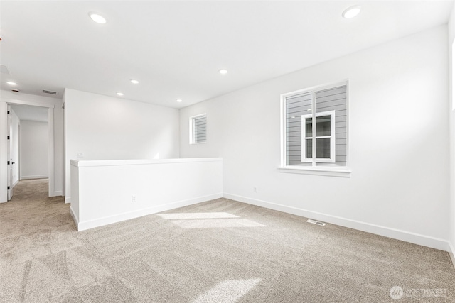 20336 150th St E Unit 588, Bonney Lake, WA 98391 - unfurnished room featuring light carpet, recessed lighting, and baseboards