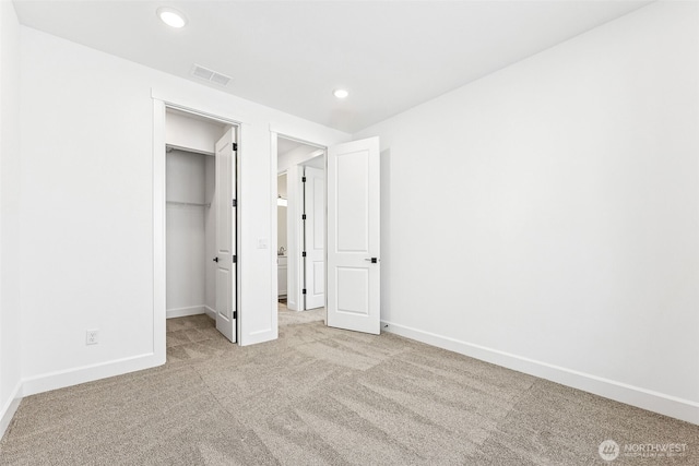 20336 150th St E Unit 588, Bonney Lake, WA 98391 - unfurnished bedroom with carpet, baseboards, a spacious closet, recessed lighting, and a closet