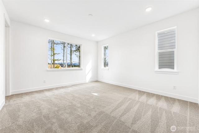 20336 150th St E Unit 588, Bonney Lake, WA 98391 - carpeted spare room featuring baseboards and recessed lighting