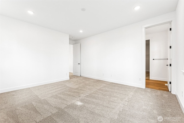 20336 150th St E Unit 588, Bonney Lake, WA 98391 - spare room featuring carpet flooring, baseboards, and recessed lighting