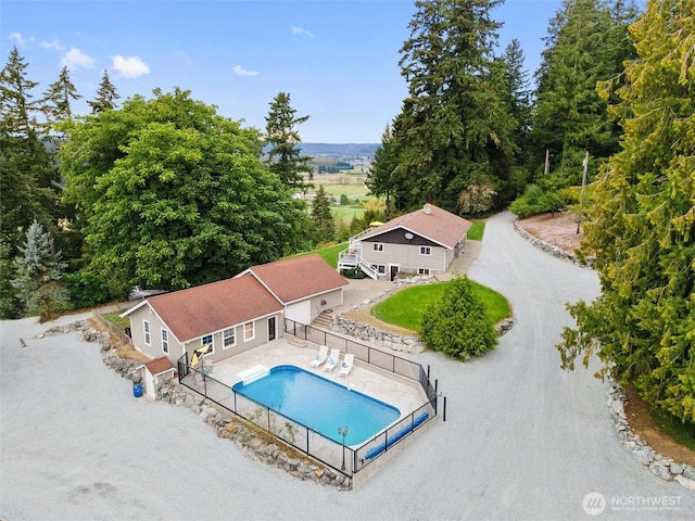 21608 186th Ave E, Orting, WA 98360 - view of swimming pool with a fenced backyard