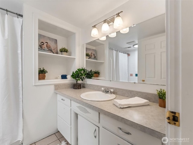 21608 186th Ave E, Orting, WA 98360 - bathroom featuring tile patterned flooring and vanity