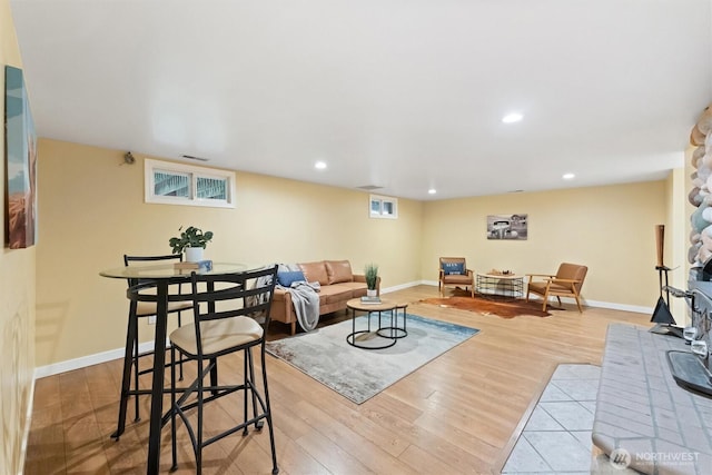 21608 186th Ave E, Orting, WA 98360 - living room featuring wood finished floors, baseboards, and recessed lighting