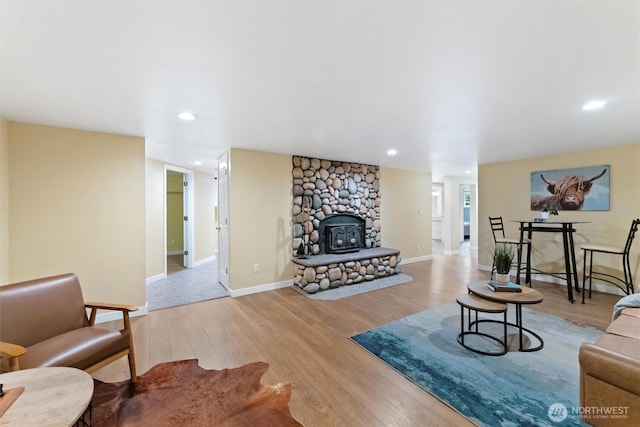 21608 186th Ave E, Orting, WA 98360 - living room featuring wood finished floors, recessed lighting, and baseboards