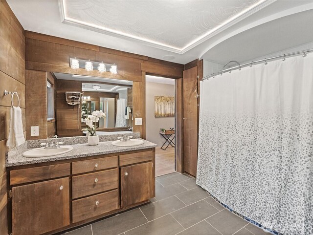 21608 186th Ave E, Orting, WA 98360 - bathroom with tile patterned flooring, double vanity, and a shower with shower curtain