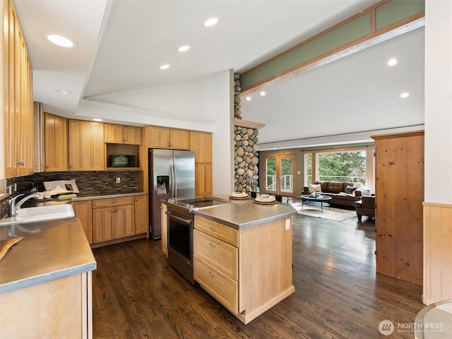21608 186th Ave E, Orting, WA 98360 - kitchen featuring a sink, appliances with stainless steel finishes, open floor plan, light brown cabinets, and backsplash