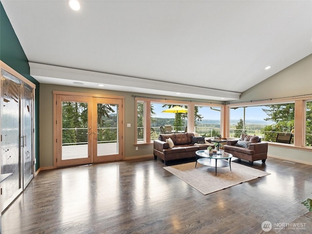 21608 186th Ave E, Orting, WA 98360 - living area with french doors, vaulted ceiling, healthy amount of natural light, baseboards, and recessed lighting