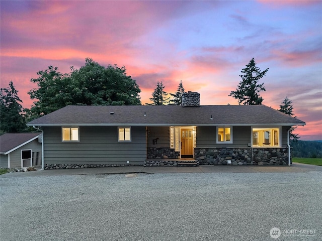 21608 186th Ave E, Orting, WA 98360 - ranch-style house featuring a chimney and stone siding