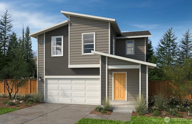 contemporary home with fence, an attached garage, and concrete driveway