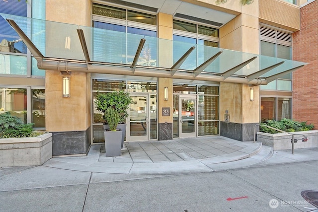 2121 Terry Ave Unit N1203, Seattle, WA 98121 - doorway to property featuring stucco siding
