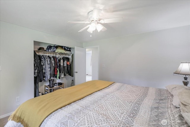 bedroom featuring ceiling fan and a closet