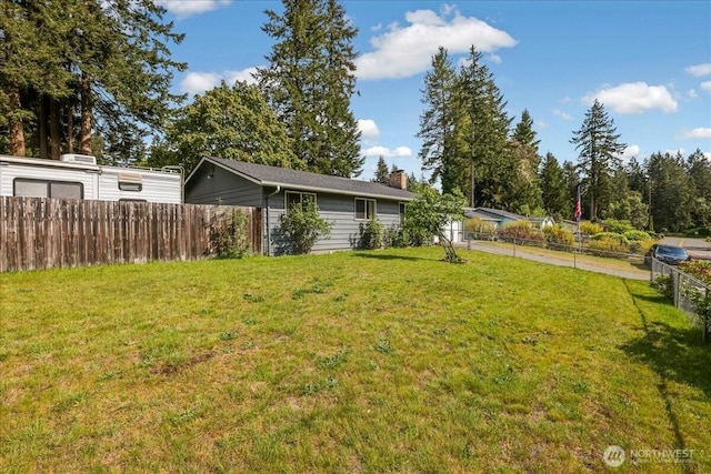 view of yard featuring fence