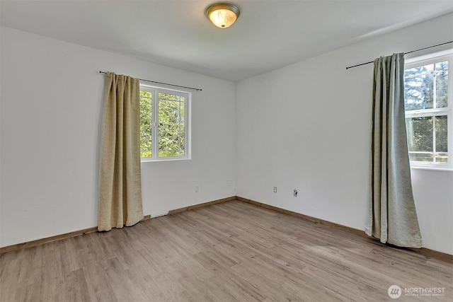 4716 167th Ave NW, Lakebay, WA 98349 - empty room with light wood-type flooring and baseboards