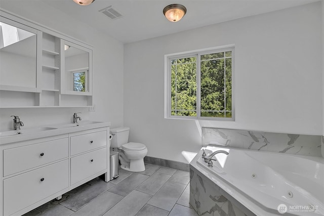 4716 167th Ave NW, Lakebay, WA 98349 - bathroom with toilet, healthy amount of natural light, a jetted tub, and double vanity