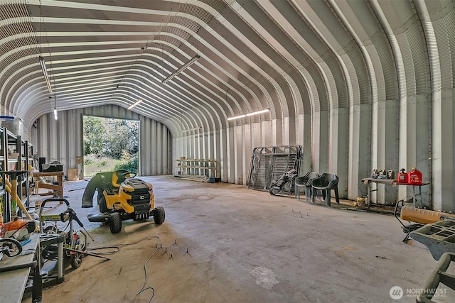 4716 167th Ave NW, Lakebay, WA 98349 - miscellaneous room featuring lofted ceiling and a garage