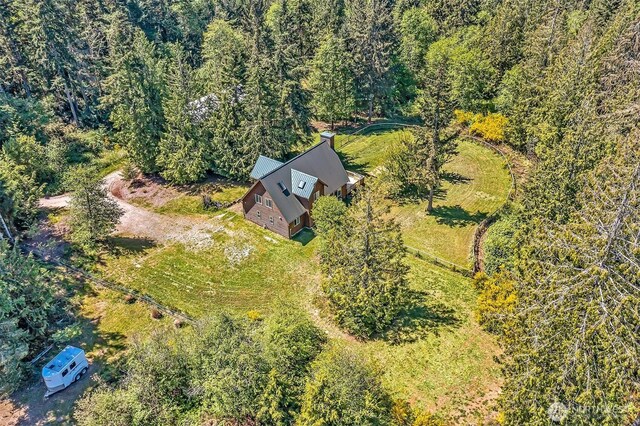 4716 167th Ave NW, Lakebay, WA 98349 - view from above of property with a heavily wooded area
