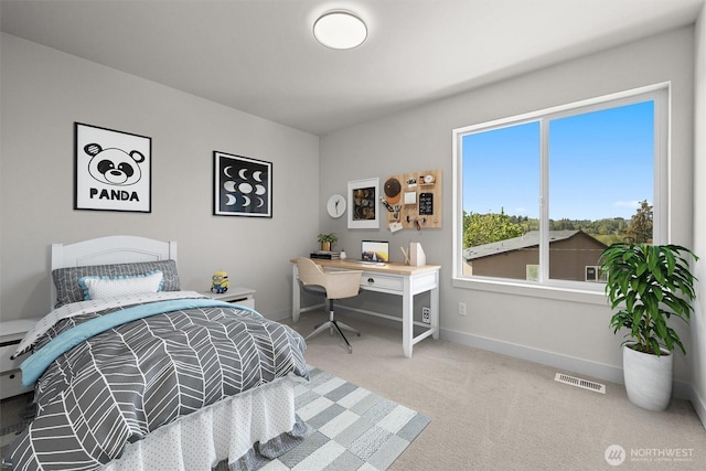 bedroom featuring carpet flooring, baseboards, and visible vents