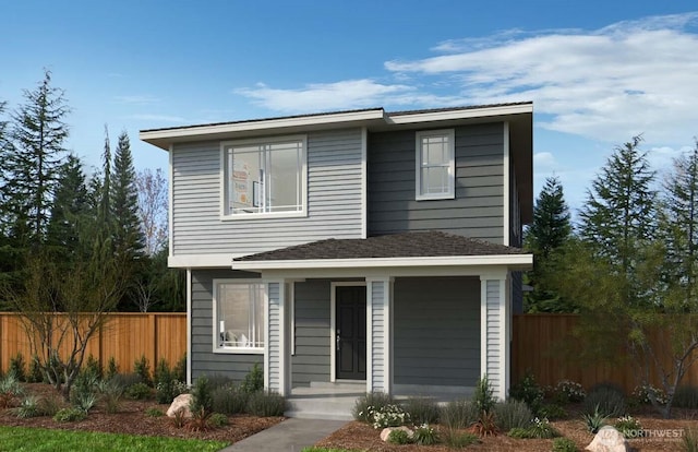 traditional-style home with fence