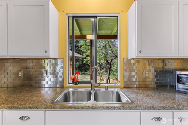 832 Elm Ave, Blaine, WA 98230 - kitchen featuring a sink, white cabinetry, decorative backsplash, and dark countertops