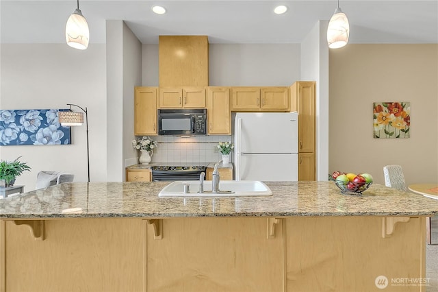 210 W Pioneer Unit 316, Puyallup, WA 98371 - kitchen featuring freestanding refrigerator, black microwave, a sink, electric stove, and light brown cabinets