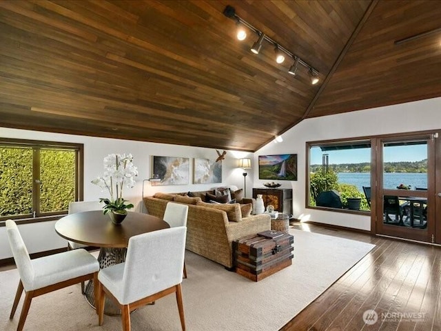 4400 E Mercer Way, Mercer Island, WA 98040 - dining room with rail lighting, wood ceiling, lofted ceiling, hardwood / wood-style floors, and baseboards
