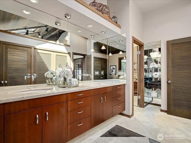 4400 E Mercer Way, Mercer Island, WA 98040 - bathroom with double vanity, baseboards, and a high ceiling