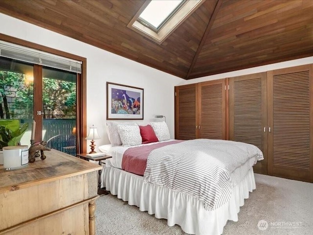 4400 E Mercer Way, Mercer Island, WA 98040 - bedroom featuring lofted ceiling, a skylight, access to outside, and wood ceiling