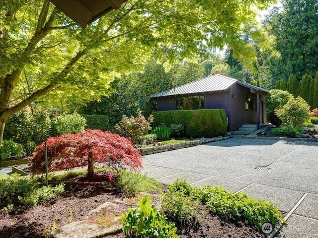 4400 E Mercer Way, Mercer Island, WA 98040 - view of front facade with a standing seam roof and metal roof