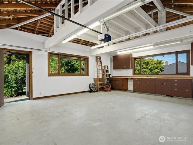 4400 E Mercer Way, Mercer Island, WA 98040 - garage with a garage door opener and baseboards