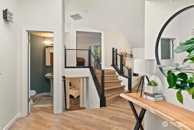 7236 Twin Cedar Ln SE, Tumwater, WA 98501 - stairs with wood finished floors and baseboards