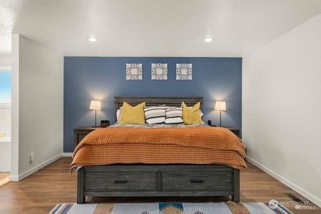 7236 Twin Cedar Ln SE, Tumwater, WA 98501 - bedroom featuring baseboards, wood finished floors, and recessed lighting