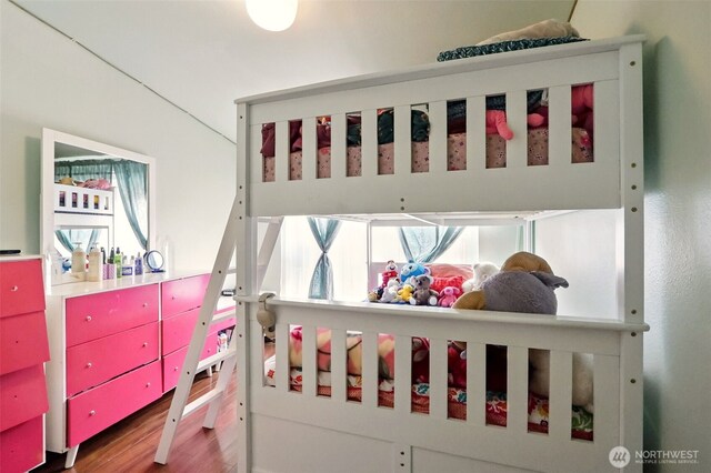 bedroom featuring wood finished floors