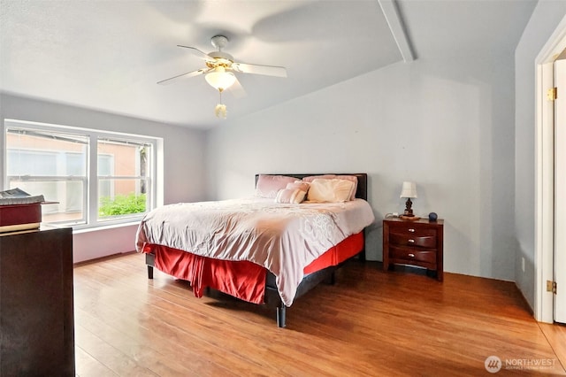 bedroom with light wood-style floors and ceiling fan