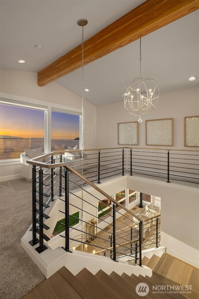 stairway with recessed lighting, baseboards, carpet flooring, a chandelier, and vaulted ceiling with beams