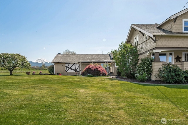 28009 SE 456th St, Enumclaw, WA 98022 - back of property with a lawn and a mountain view