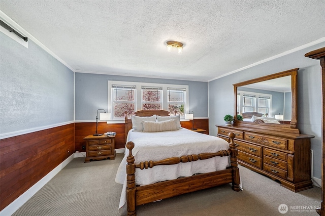 28009 SE 456th St, Enumclaw, WA 98022 - bedroom featuring carpet, a textured ceiling, ornamental molding, wainscoting, and wooden walls