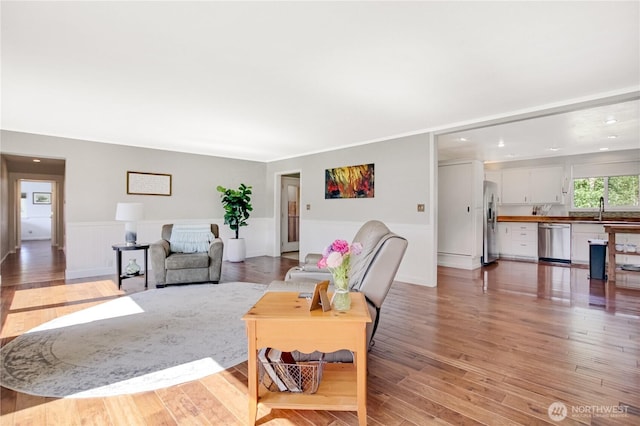 47 W Sunny Sands Rd, Cathlamet, WA 98612 - living area featuring recessed lighting, a wainscoted wall, and light wood-style floors