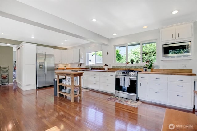 47 W Sunny Sands Rd, Cathlamet, WA 98612 - kitchen featuring stainless steel appliances, recessed lighting, light wood-style flooring, white cabinetry, and wooden counters
