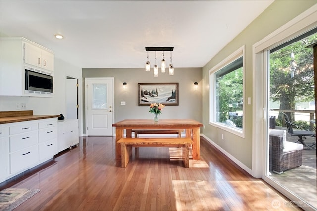 47 W Sunny Sands Rd, Cathlamet, WA 98612 - dining space featuring light wood finished floors, recessed lighting, baseboards, and a notable chandelier