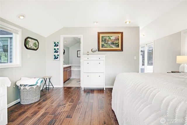 47 W Sunny Sands Rd, Cathlamet, WA 98612 - bedroom featuring ensuite bathroom, dark wood-type flooring, baseboards, and lofted ceiling