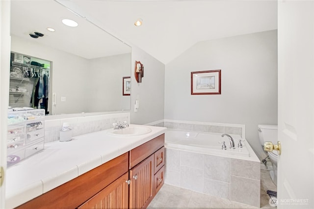 47 W Sunny Sands Rd, Cathlamet, WA 98612 - full bathroom featuring toilet, vanity, recessed lighting, tile patterned floors, and a garden tub
