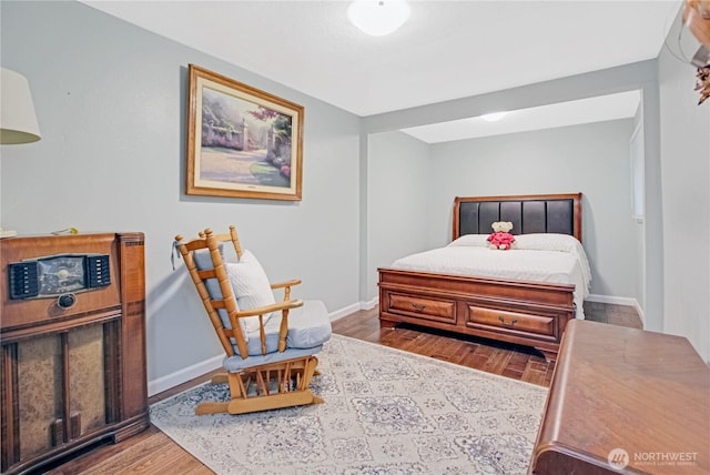 47 W Sunny Sands Rd, Cathlamet, WA 98612 - bedroom featuring baseboards and wood finished floors