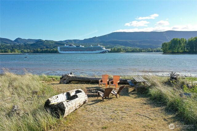 47 W Sunny Sands Rd, Cathlamet, WA 98612 - water view featuring an outdoor fire pit and a mountain view