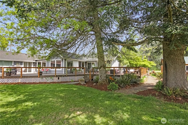 47 W Sunny Sands Rd, Cathlamet, WA 98612 - back of house featuring a deck and a lawn