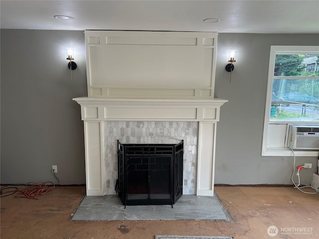 details featuring a premium fireplace and cooling unit