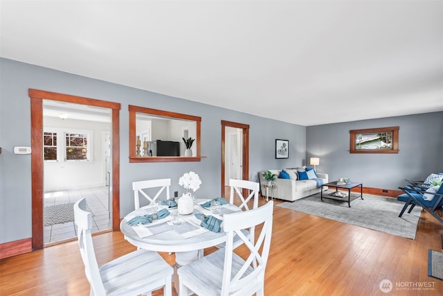dining room featuring light wood-style flooring