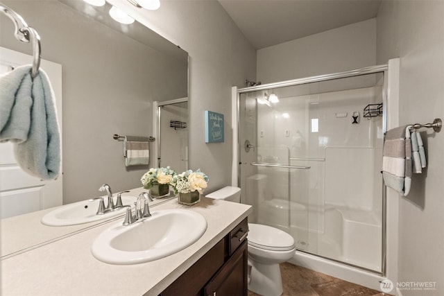 10421 12th St E, Edgewood, WA 98372 - full bathroom with a shower stall, vanity, and wood finished floors