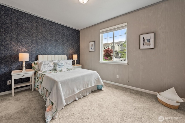 bedroom with carpet and baseboards
