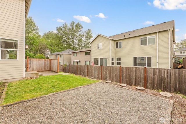 view of yard with a patio area and a residential view