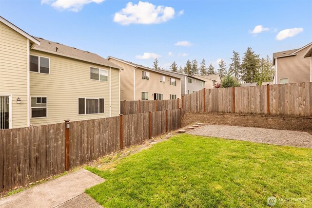 view of yard featuring a residential view